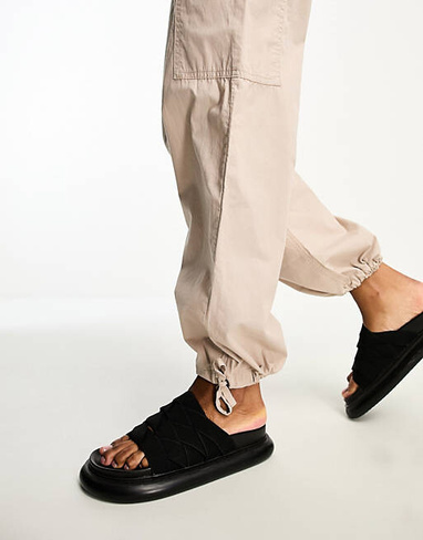 Черные брюки карго с застежкой на пуговицы ASOS DESIGN Tall